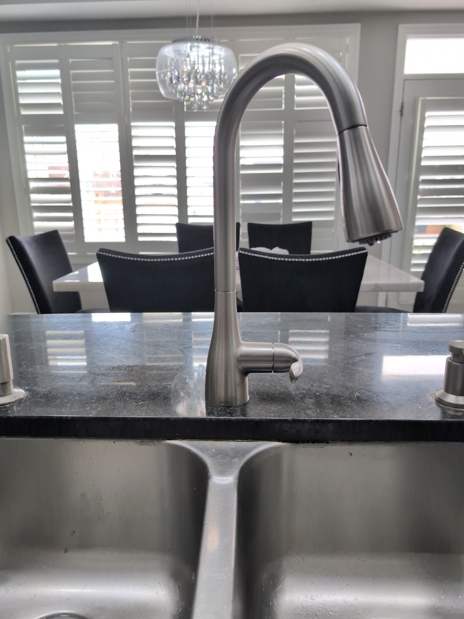 Modern kitchen sink with arc faucet